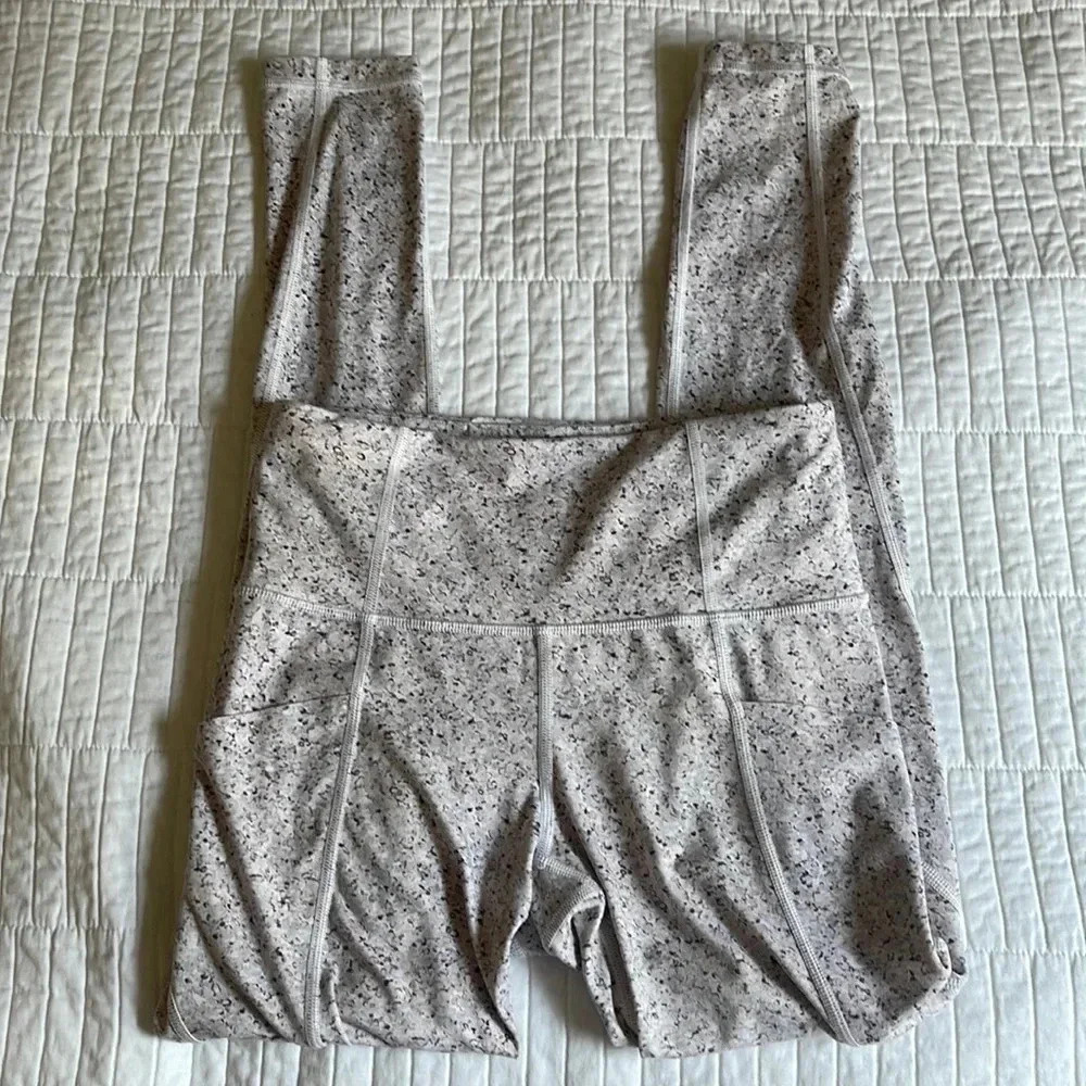 Athleta Salutation stash pocket tight size XS